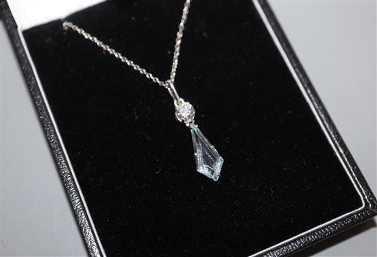 A modern Swedish 18ct white metal, diamond and shaped aquamarine set pendant, on a 750 fine link chain, pendant 19mm.
